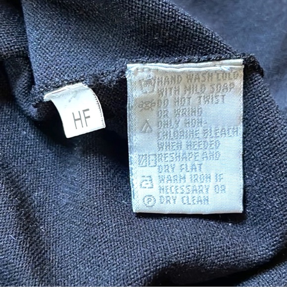 August Silk Logic black top. White criss crossed ribbons throughout neckline. - Picture 4 of 4